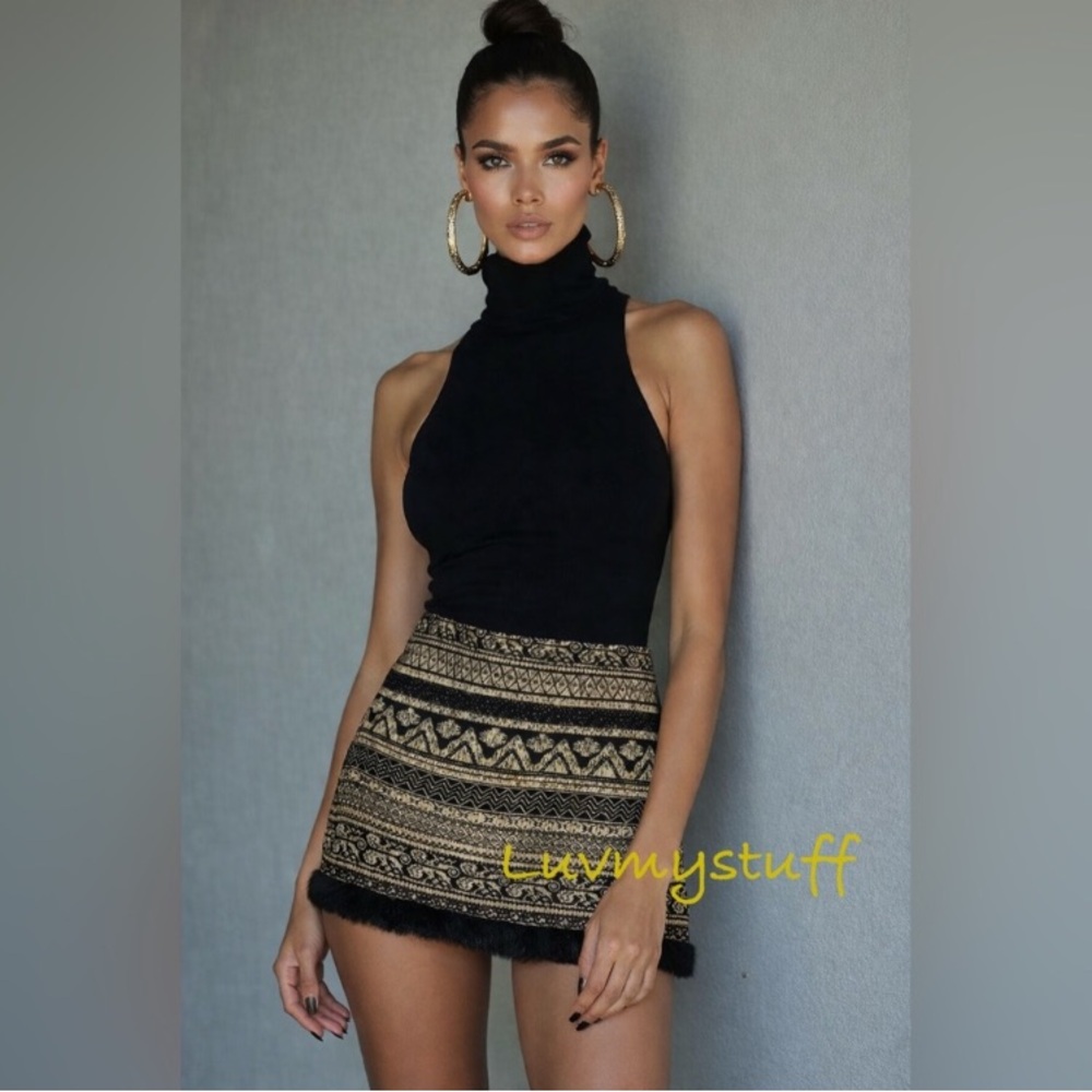 Cute Black & Gold Patterned Mini Skirt with Black Finge hem.